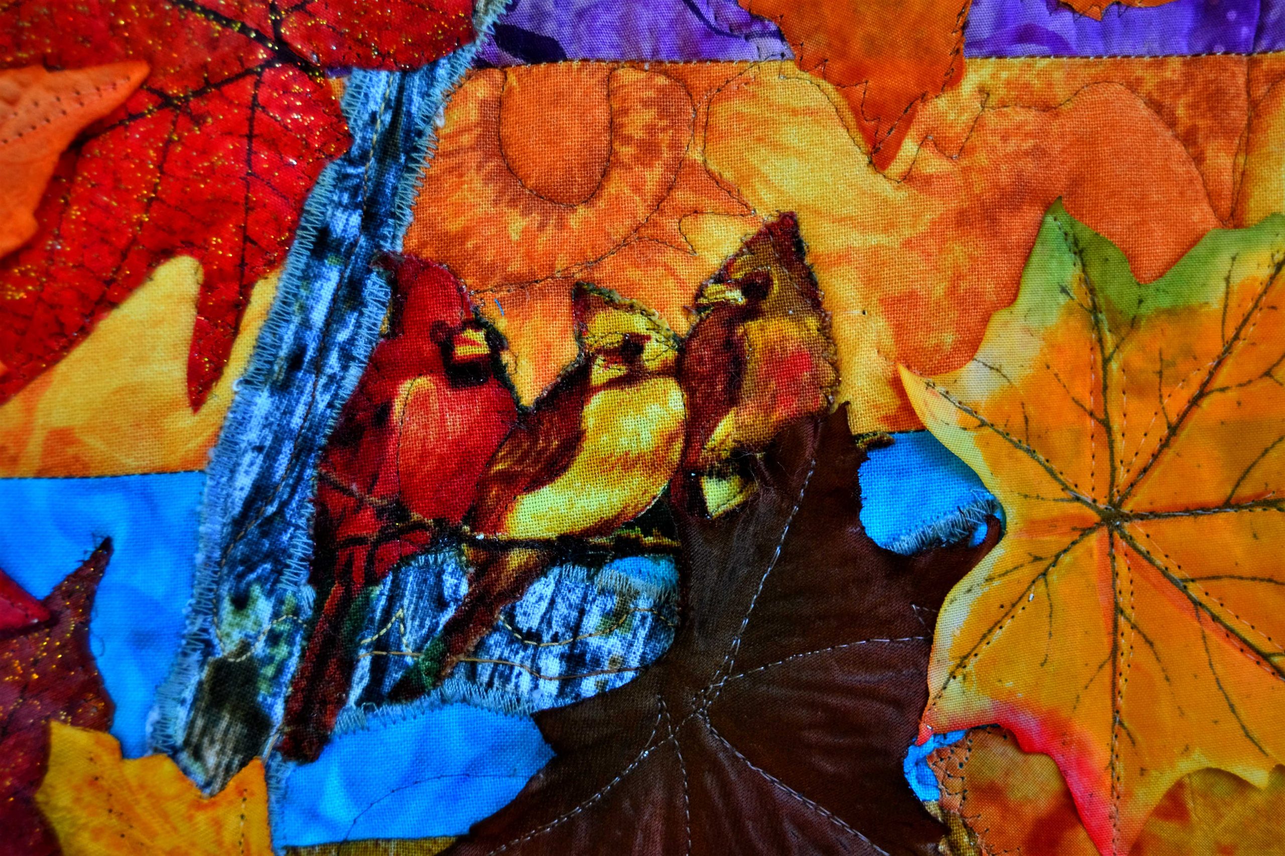 three fabric birds in a maple tree art panel