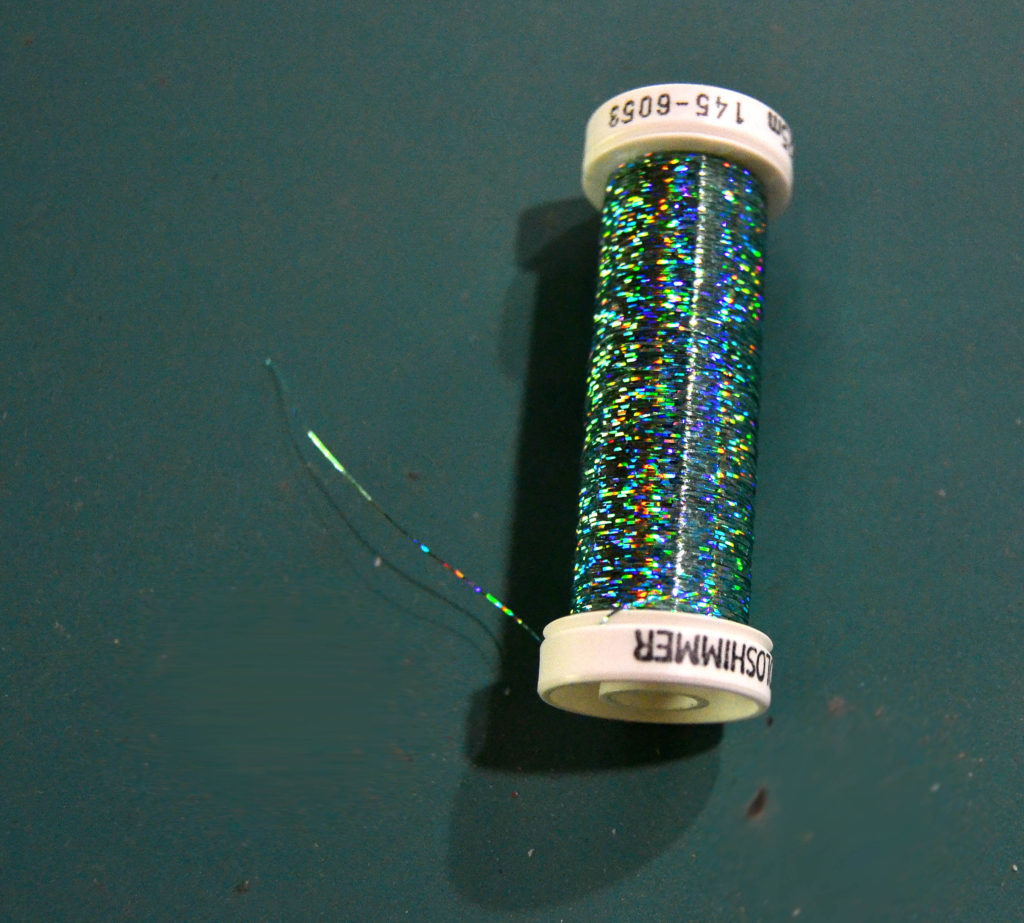 Iridescent blue and green variegated metallic thread