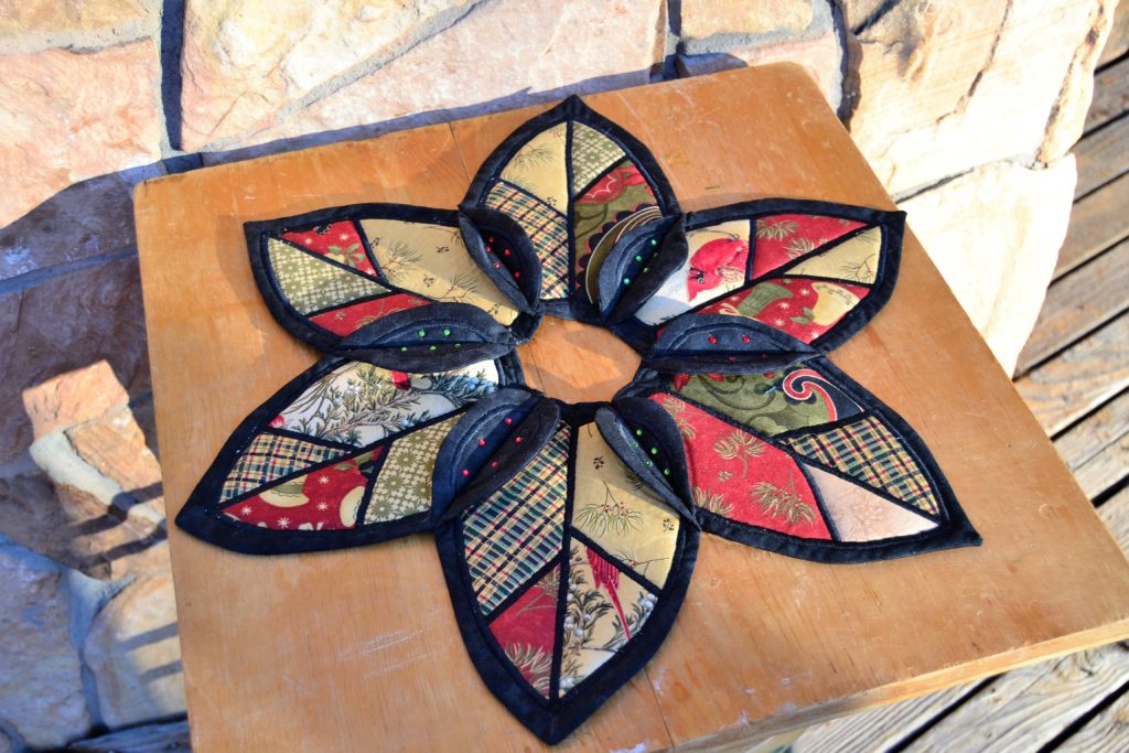 Rustic Christmas table topper holds its shape so well because of quilting foam