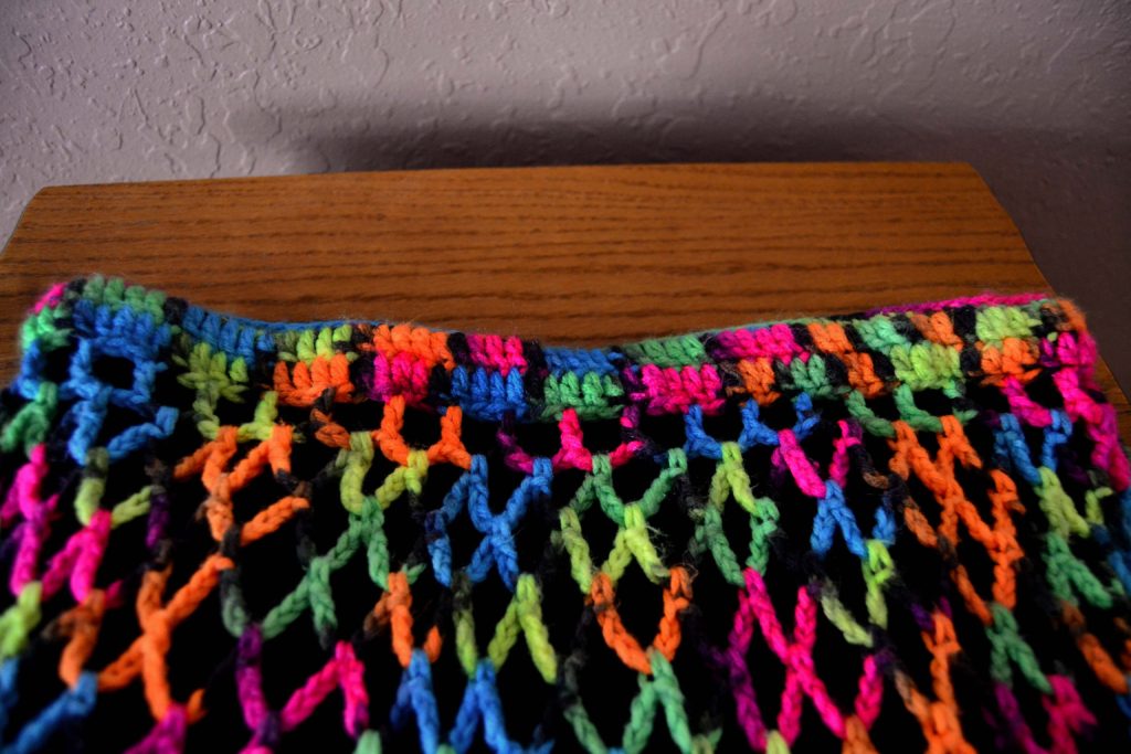 The waistband of the variegated neon skirt is where this simple crochet project started to go wrong
