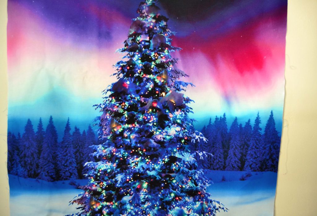 Christmas tree under the northern lights - one of four identical fabric panels for quilting a fractured small quilt