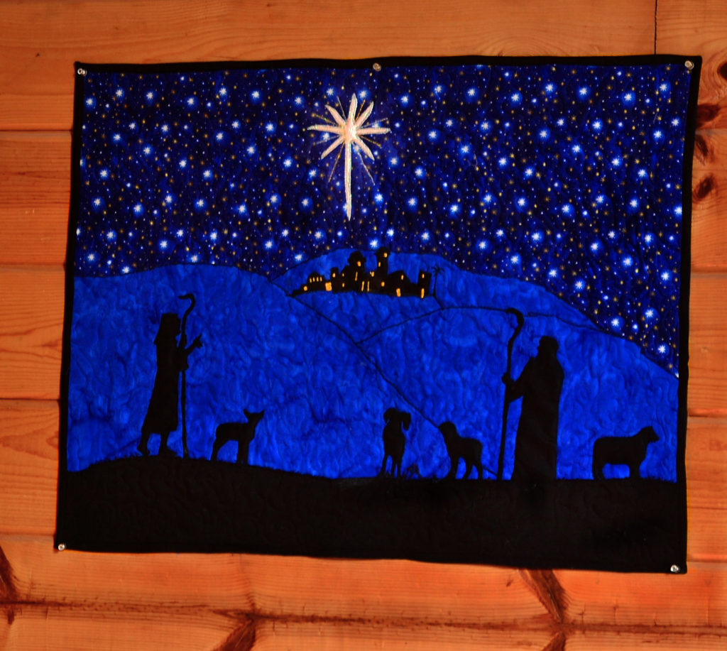 Shepherds look at the star of Bethlehem - quilted using free motion quilting techniques