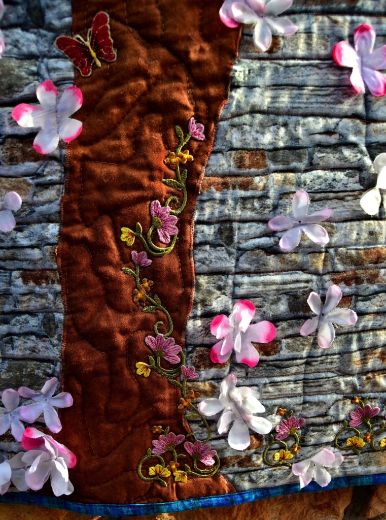 Stone Wall with tree trunk peacock panel - quilted using free motion quilting techniques