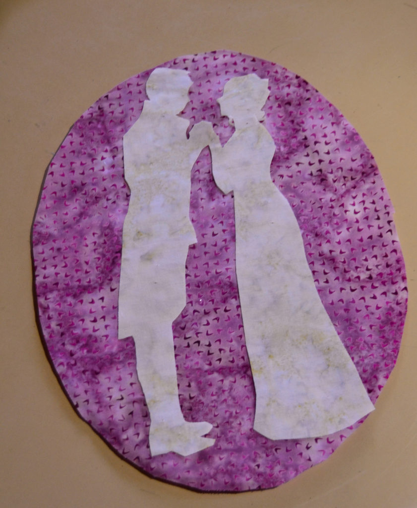 soft paperbacked fusible webbing is used to make these cream silhouettes stand out