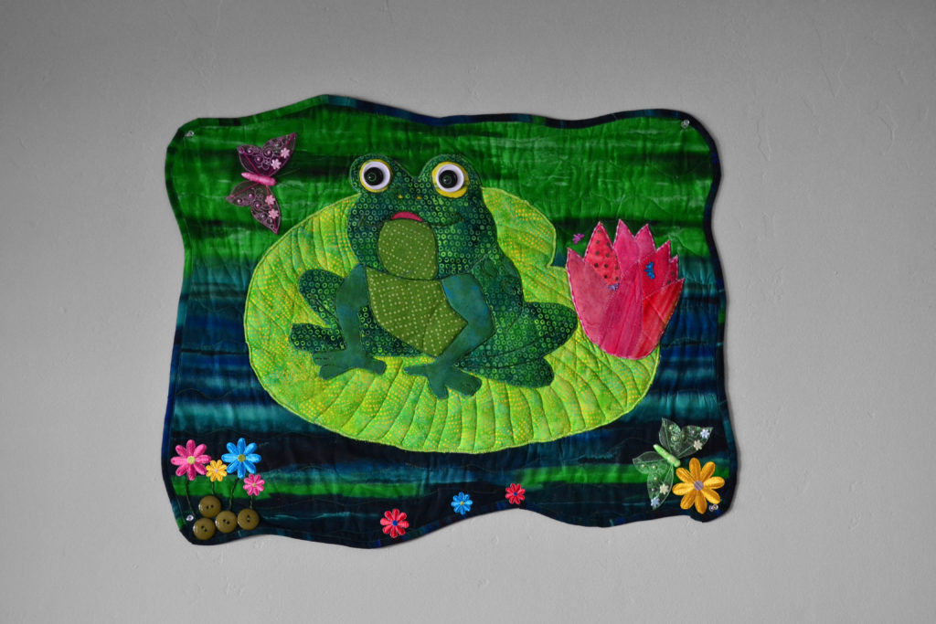 green frog on lily pad pop-up panel