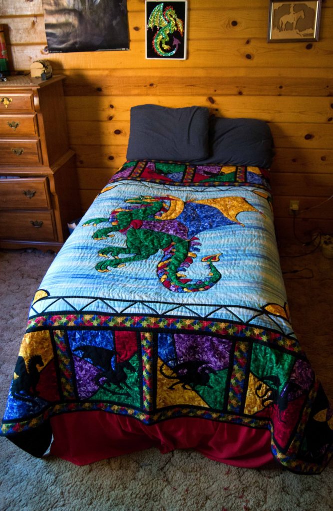 Dragons in My Window stained glass dragon silhouette quilt