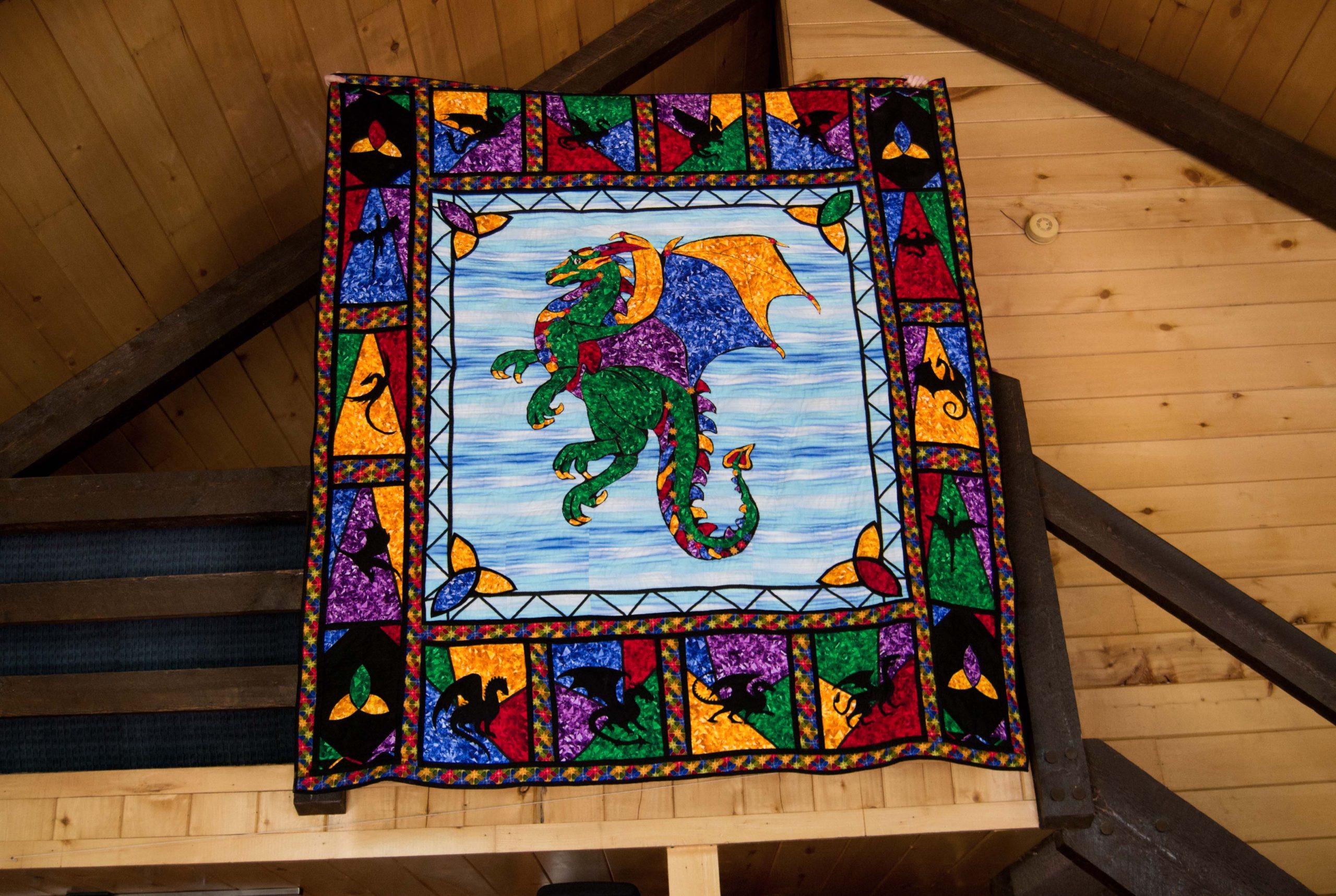 Dragons in My Window stained glass dragon silhouette quilt