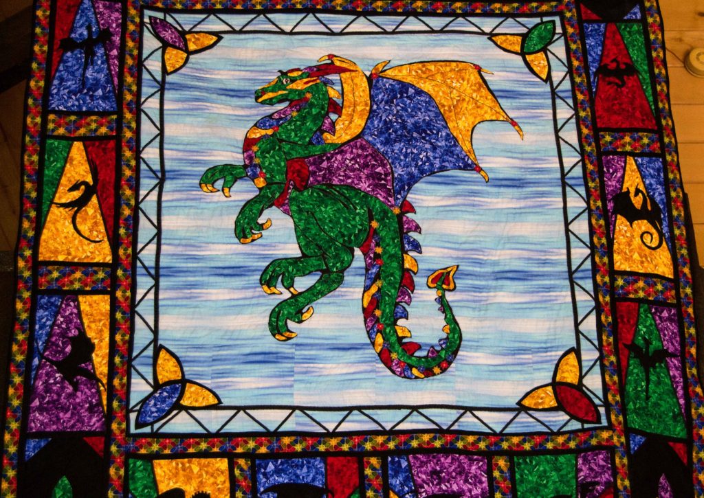 stained glass dragon in jewel colors