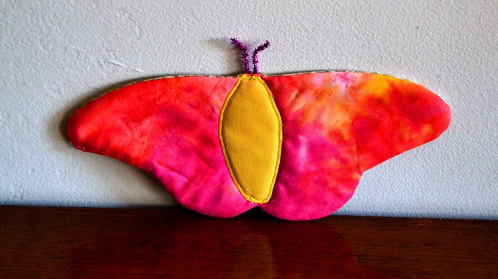 Pink and yellow butterfly shaped potholder
