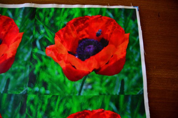 Jewel tone poppy with Bee 4 set printed panel top corner close up