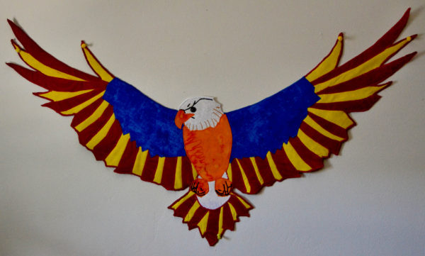 Shaped bald eagle wall hanging with Arizona State flag colors, red, blue, yellow, orange, and white