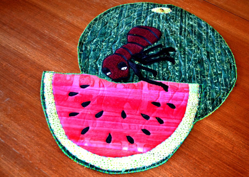 ant on a watermelon summer picnic crasher