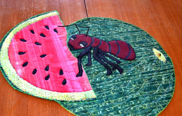 ant on a watermelon summer picnic crasher