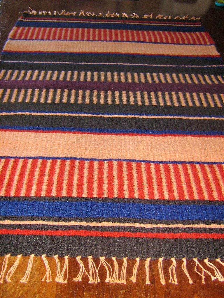 Multi-colored woven rug 
