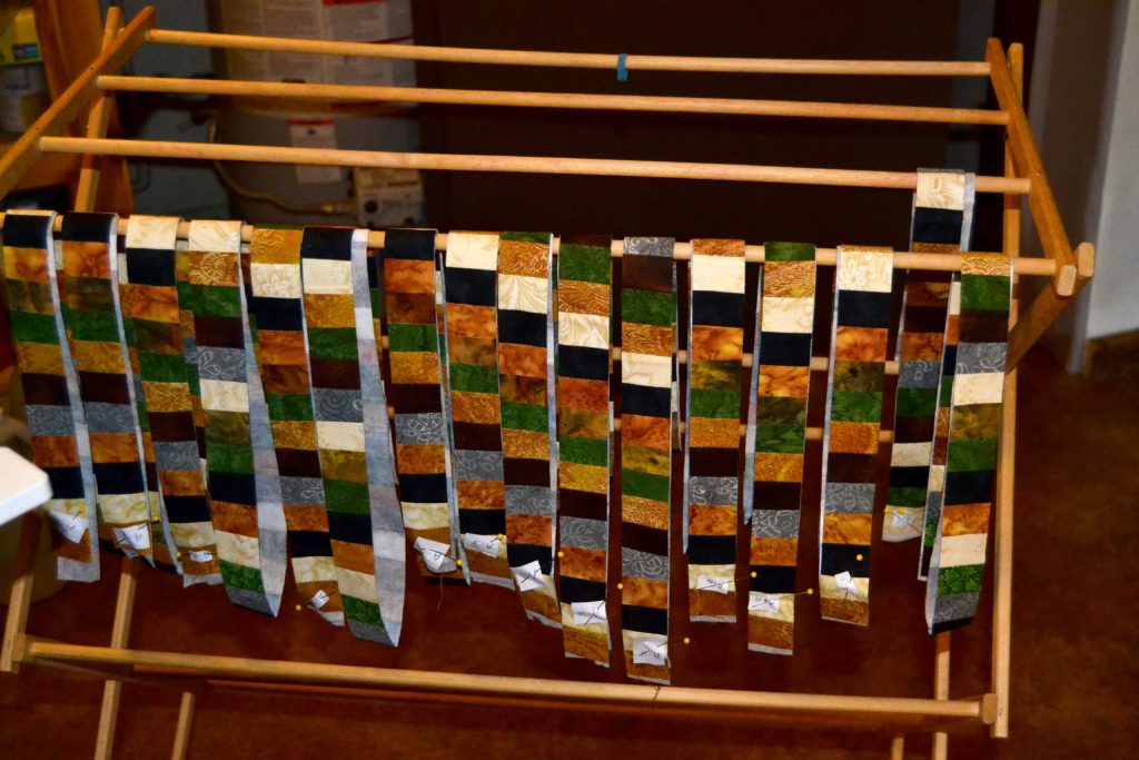 Mosaic jungle strip sets for tiger quilt