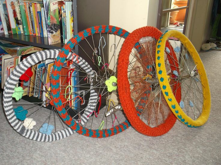 Yarn bombing bicycle wheels bright colors