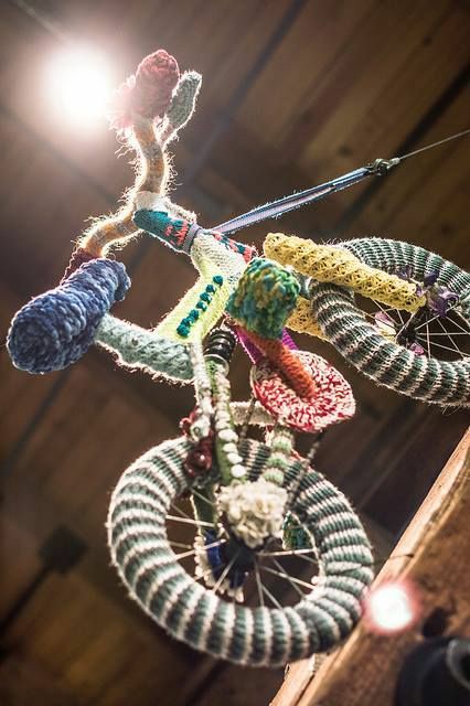 Yarnbombing bicycle with striped wheels