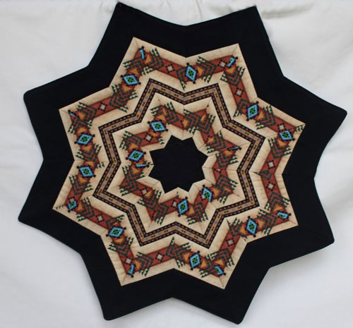 Star shaped table topper expanding design