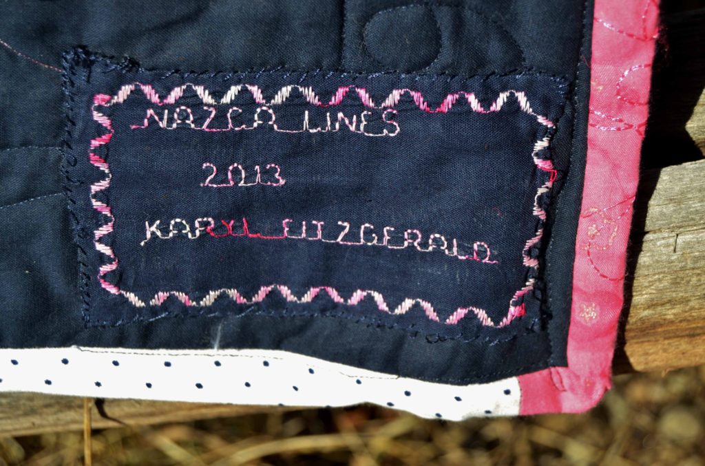 Nazca Lines name tag with smooth and flat binding - want to know how to sew binding on a quilt