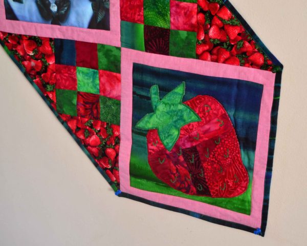 Shaped strawberry quilt applique on farm-to-table runner